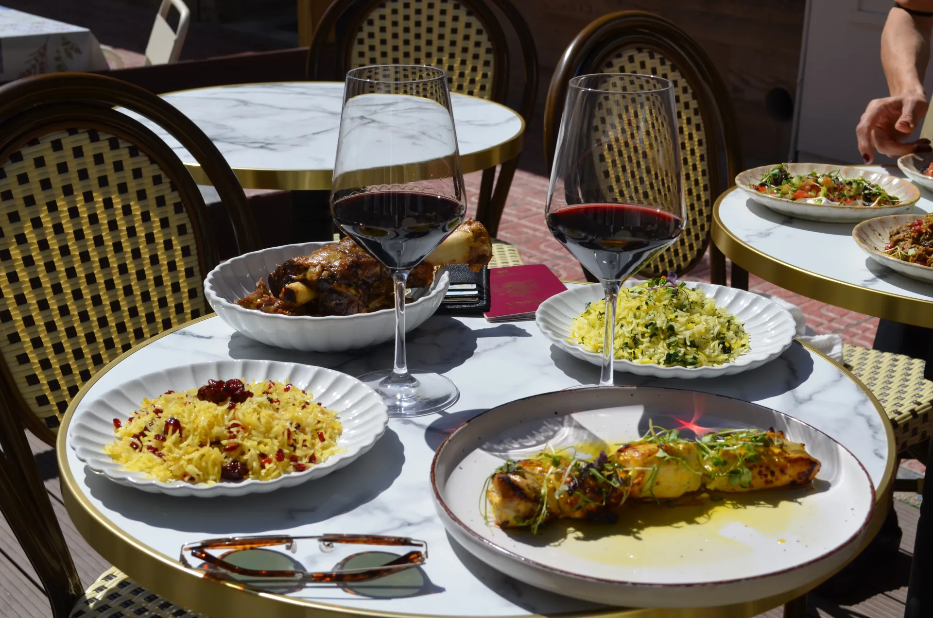Dinner table with wine and Persian dishes